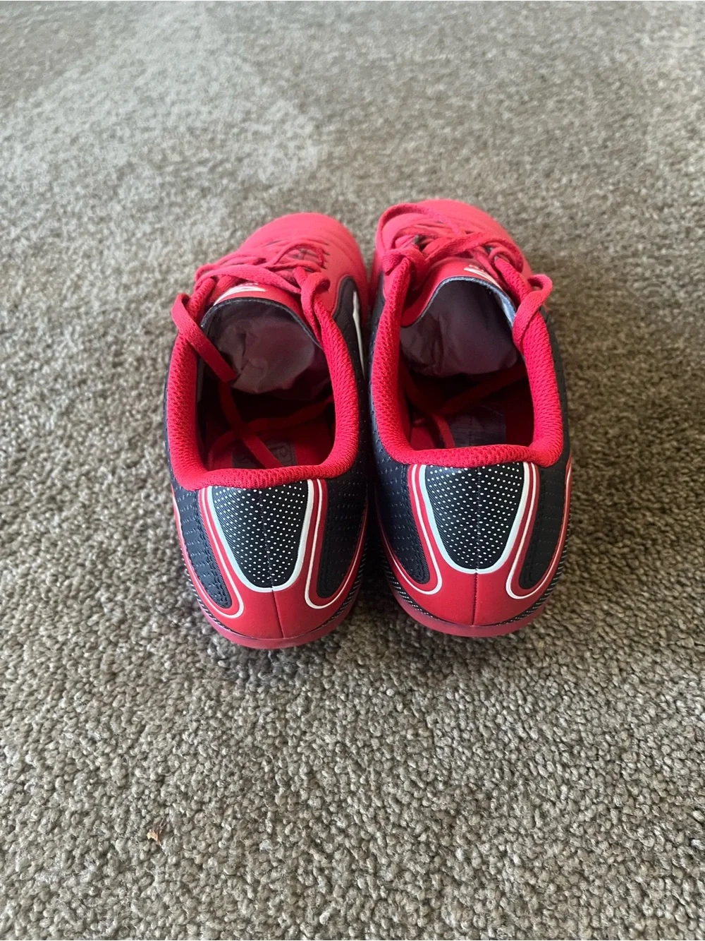 Umbro Red and Black Soccer Cleats with White Logo